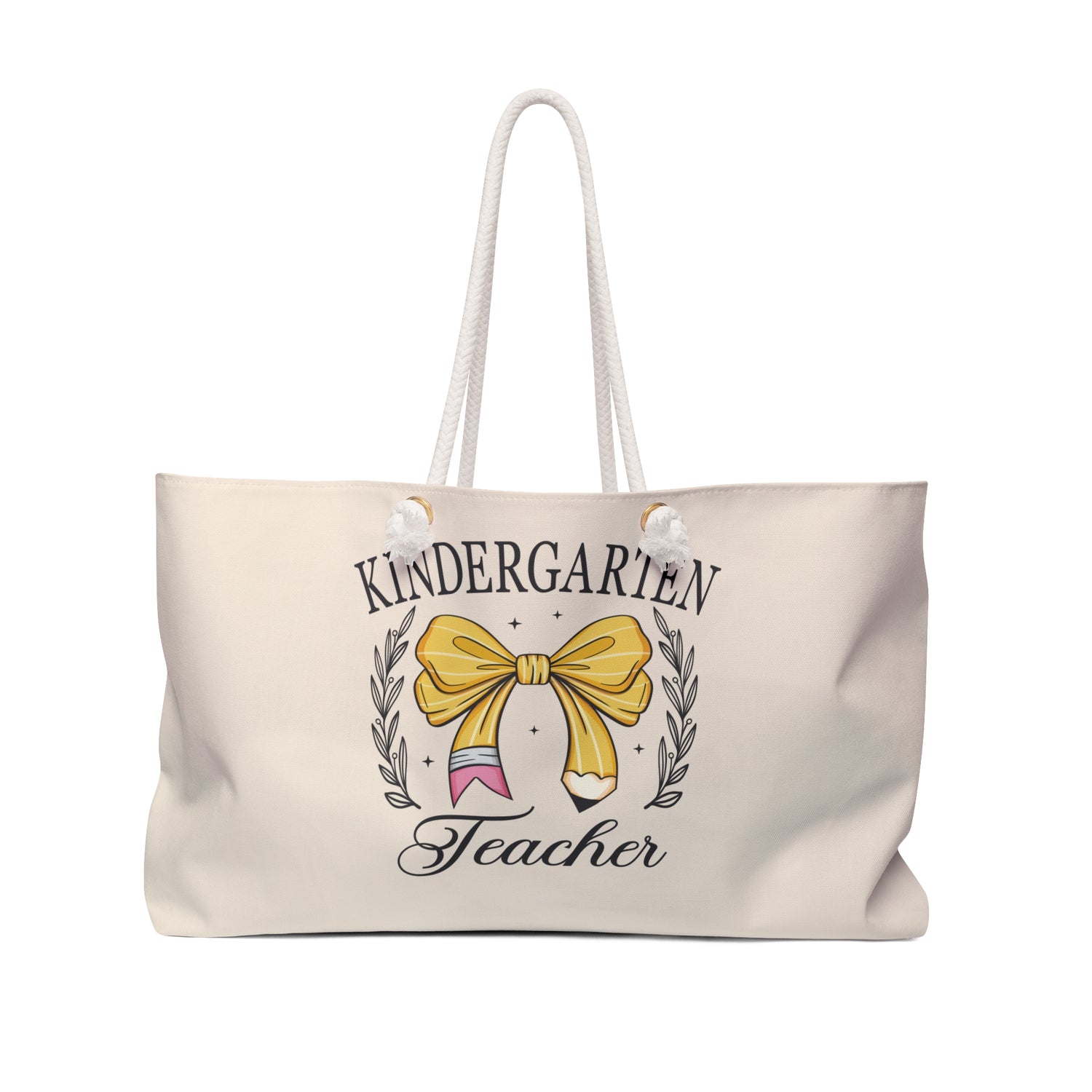 Weekender bag featuring the words “Kindergarten Teacher” with a bow and wreath design on a light background with rope handles.