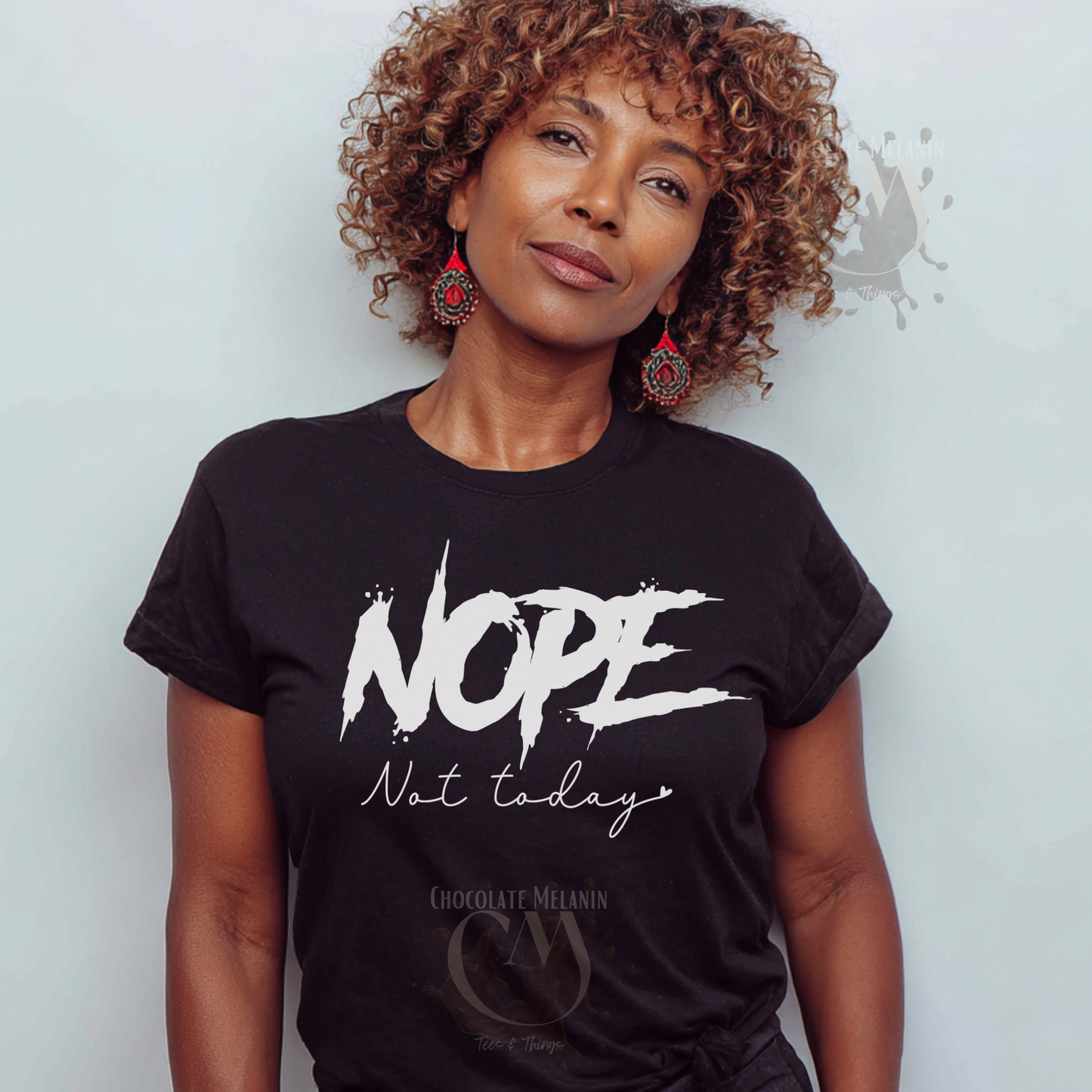 black graphic t-shirt featuring the phrase "NOPE. not today." in bold lettering for a confident, attitude driven statement. 